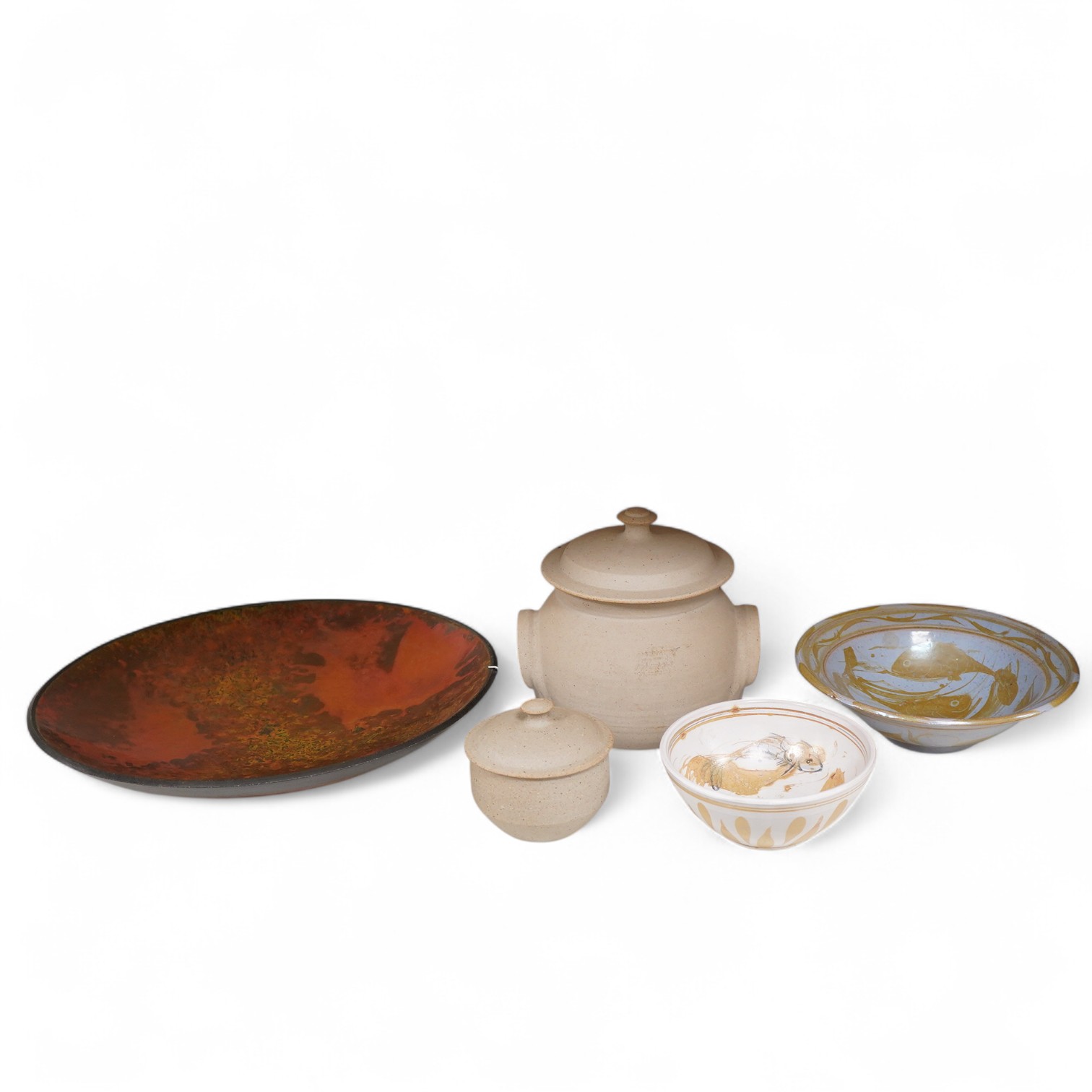 An Andrew Hill charger, 44cm diameter, two Mohammed Hamid (Lewes) bowls and two unsigned Bernard Leach pottery jars and covers